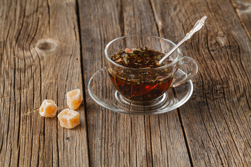 Herbal tea on rustic wooden table
