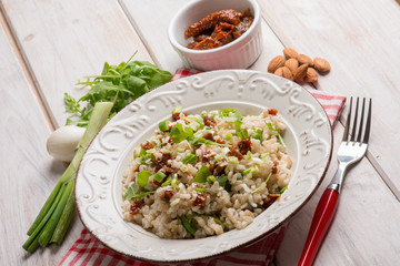 risotto with arugula dried tomatoes and almond