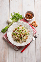 risotto with arugula dried tomatoes and almond