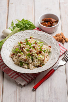 risotto with arugula dried tomatoes and almond