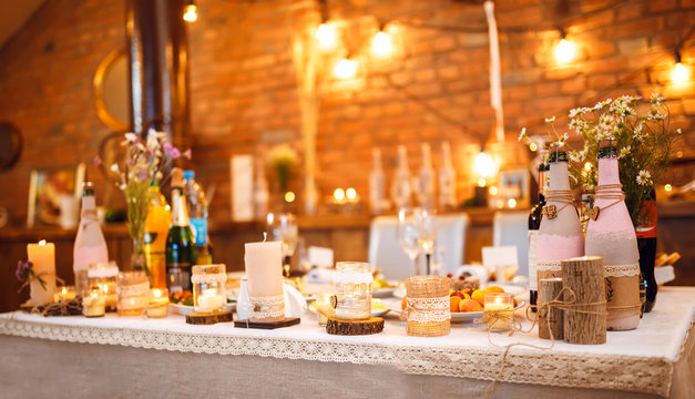 Beautiful decorated wedding table. candles on the table during the evening wedding dinner
