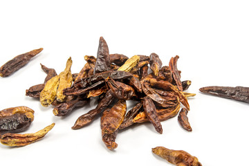 Dried chilli on white background with space for text