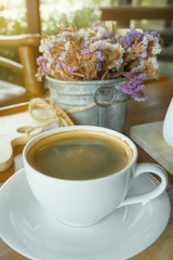 Coffee set with dessert on table