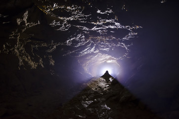 bright light in a dark cave