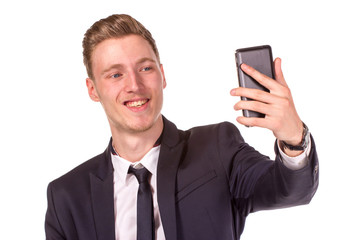 Happy business man with smart hone.