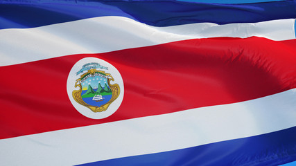 Costa Rica flag waving against clean blue sky, close up, isolated with clipping path mask alpha channel transparency