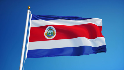 Costa Rica flag waving against clean blue sky, close up, isolated with clipping path mask alpha channel transparency