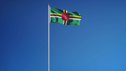 Dominica flag waving against clean blue sky, long shot, isolated with clipping path mask alpha channel transparency