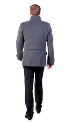 Back view of going  young business man in coat.  walking young businessman . Rear view people collection.  backside view of person.  Isolated over white background.