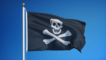 Pirate flag waving against clean blue sky, close up, isolated with clipping path mask alpha channel transparency