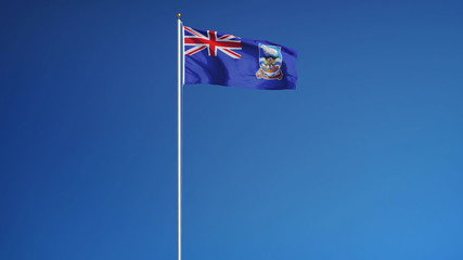 Falkland Islands flag waving against clean blue sky, long shot, isolated with clipping path mask alpha channel transparency