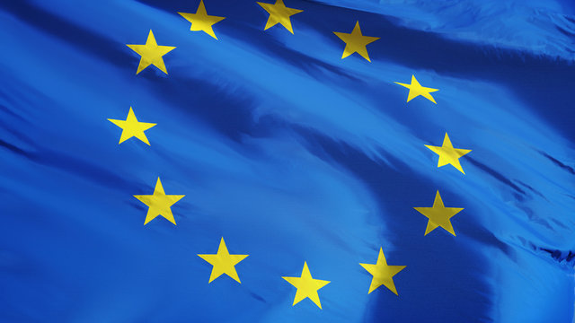 European Union flag waving against clean blue sky, close up, isolated with clipping path mask alpha channel transparency