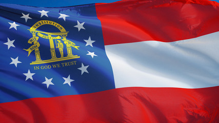 Georgia (U.S. state) flag waving against clean blue sky, close up, isolated with clipping path mask...