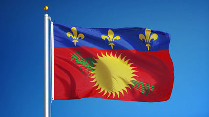 Guadeloupe flag waving against clean blue sky, close up, isolated with clipping path mask alpha channel transparency