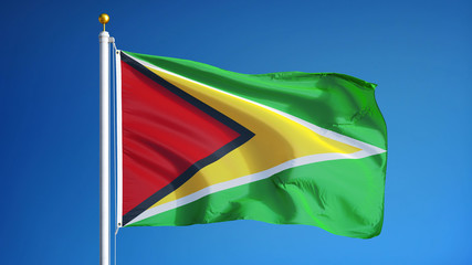 Guyana flag waving against clean blue sky, close up, isolated with clipping path mask alpha channel transparency