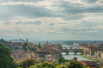 Fototapeta na wymiar Ponte Vecchio in the beautiful tuscany landscape