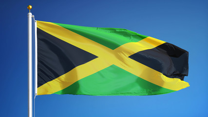 Jamaica flag waving against clean blue sky, close up, isolated with clipping path mask alpha channel transparency