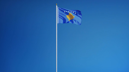 Kosovo flag waving against clean blue sky, long shot, isolated with clipping path mask alpha channel transparency