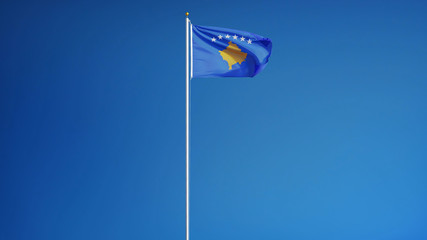 Kosovo flag waving against clean blue sky, long shot, isolated with clipping path mask alpha channel transparency