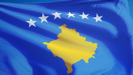 Kosovo flag waving against clean blue sky, close up, isolated with clipping path mask alpha channel transparency