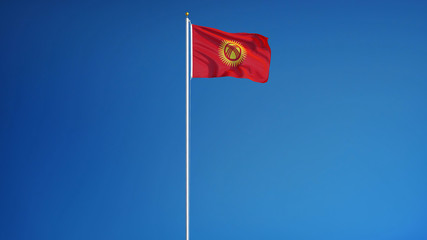 Kyrgyzstan flag waving against clean blue sky, long shot, isolated with clipping path mask alpha channel transparency