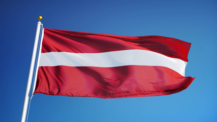 Fototapeta na wymiar Latvia flag waving against clean blue sky, close up, isolated with clipping path mask alpha channel transparency