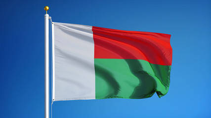Madagascar flag waving against clean blue sky, close up, isolated with clipping path mask alpha channel transparency