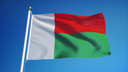 Madagascar flag waving against clean blue sky, close up, isolated with clipping path mask alpha channel transparency