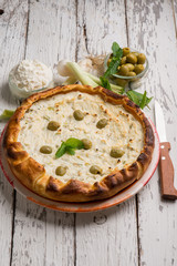 salted cake with ricotta green olives and mint