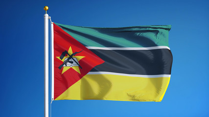 Mozambique flag waving against clean blue sky, close up, isolated with clipping path mask alpha channel transparency