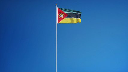 Mozambique flag waving against clean blue sky, long shot, isolated with clipping path mask alpha channel transparency