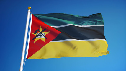 Mozambique flag waving against clean blue sky, close up, isolated with clipping path mask alpha channel transparency