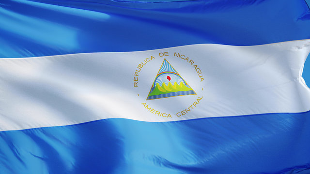 Nicaragua flag waving against clean blue sky, close up, isolated with clipping path mask alpha channel transparency
