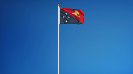 Papua New Guinea flag waving against clean blue sky, long shot, isolated with clipping path mask alpha channel transparency