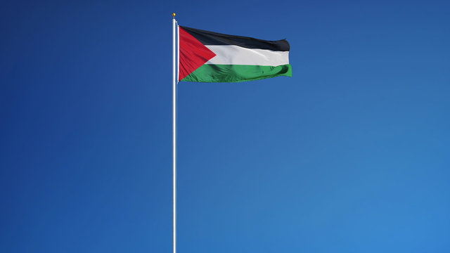 Palestine flag waving against clean blue sky, long shot, isolated with clipping path mask alpha channel transparency