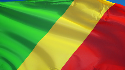 Republic of the Congo flag waving against clean blue sky, close up, isolated with clipping path mask alpha channel transparency