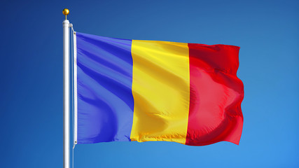 Romania flag waving against clean blue sky, close up, isolated with clipping path mask alpha channel transparency