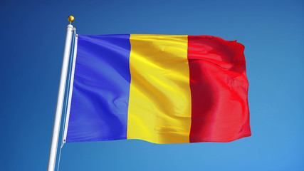 Romania flag waving against clean blue sky, close up, isolated with clipping path mask alpha channel transparency