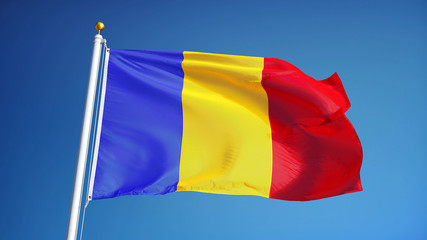 Romania flag waving against clean blue sky, close up, isolated with clipping path mask alpha channel transparency