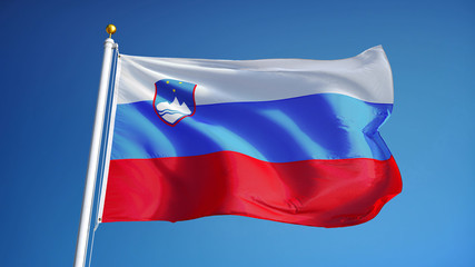 Slovenia flag waving against clean blue sky, close up, isolated with clipping path mask alpha channel transparency