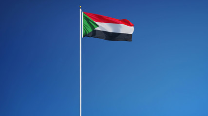 Sudan flag waving against clean blue sky, long shot, isolated with clipping path mask alpha channel transparency