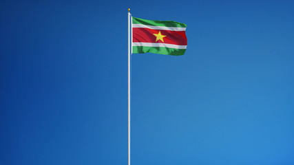 Suriname flag waving against clean blue sky, long shot, isolated with clipping path mask alpha channel transparency