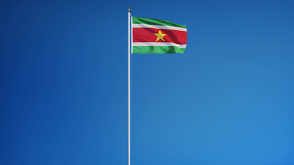 Suriname flag waving against clean blue sky, long shot, isolated with clipping path mask alpha channel transparency