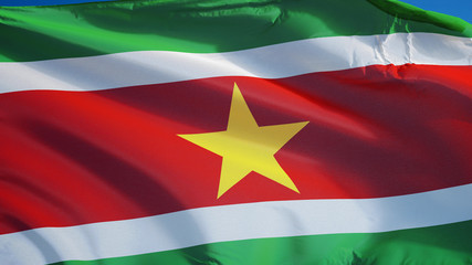 Suriname flag waving against clean blue sky, close up, isolated with clipping path mask alpha channel transparency