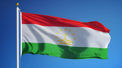 Tajikistan flag waving against clean blue sky, close up, isolated with clipping path mask alpha channel transparency