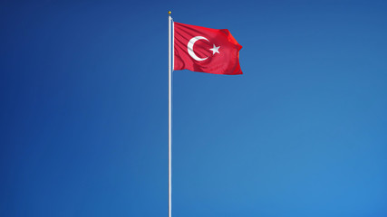 Turkey flag waving against clean blue sky, long shot, isolated with clipping path mask alpha channel transparency