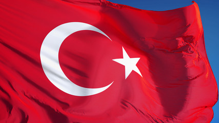 Turkey flag waving against clean blue sky, close up, isolated with clipping path mask alpha channel transparency