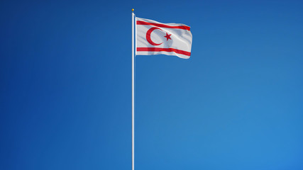 Turkish Republic of Northern Cyprus flag against clean blue sky, long shot isolated with clipping path mask alpha channel transparency