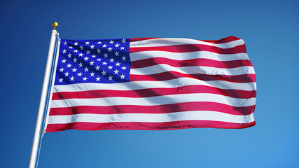 USA flag waving against clean blue sky, close up, isolated with clipping path mask alpha channel transparency