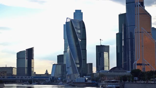 The clouds floating over the skyscrapers of the Moscow International Business Center (Moscow-City) and the Bagration Bridge. Time-lapse. UHD - 4K. September 02, 2016. Moscow. Russia